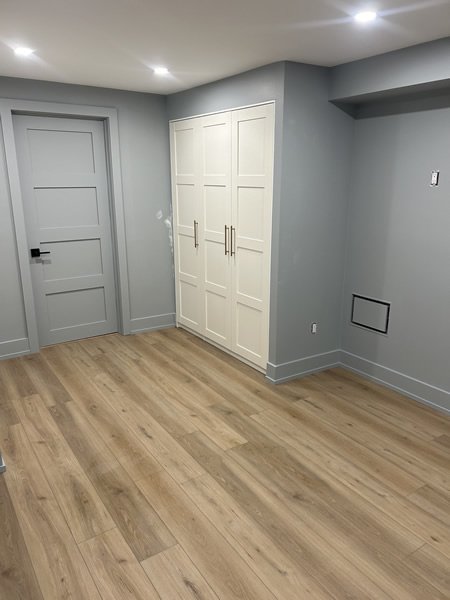 Basement room finishing with laminate flooring GTA